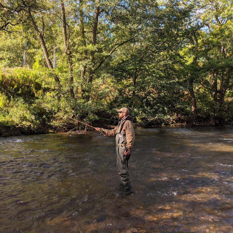 angler enjoying a peak district fly fishing lesson
